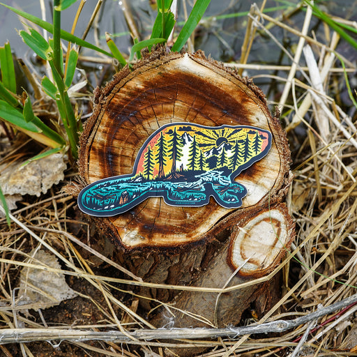 Beaver Sticker with outdoor scenery inside it.